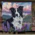 Black and white border collie in the foreground blanket