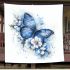 Blue butterfly with white flowers around blanket