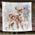 Cute baby deer in the snow blanket