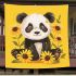 Cute baby panda with sunflowers on a yellow blanket