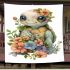 Cute baby turtle with big eyes and colorful flowers blanket