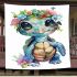 Cute baby turtle with big eyes and colorful flowers blanket
