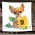 Cute chihuahua puppy with big eyes sitting next to a sunflower blanket