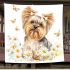 Cute little yorkshire terrier with long hair and bows in her ears blanket