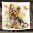 Cute little yorkshire terrier with long hair and bows in her ears blanket