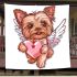 Cute valentine yorkie with angel wings holding a heart blanket