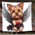 Cute valentine yorkie with angel wings holding heart blanket