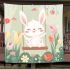 Cute white rabbit sitting on the swing blanket