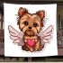 Cute yorkshire terrier with angel wings and heart blanket