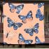 Seamless pattern with a digital illustration of blue butterflies blanket