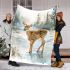 Adorable fawn standing in the snow blanket