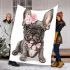 Adorable grey french bulldog puppy wearing pink roses blanket