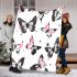 Black and white butterfly pattern with pink accents blanket