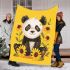 Cute baby panda with sunflowers on a yellow blanket