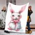 Cute cartoon bunny with a pink bow holding a heart blanket