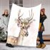 Cute deer with a floral wreath on its horns blanket