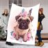 Cute pug puppy with pink roses and a butterfly blanket