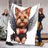 Cute valentine yorkie with angel wings holding heart blanket