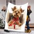 Cute yorkshire terrier inside blanket