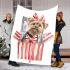 Cute yorkshire terrier inside an open present box blanket