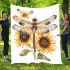 A watercolor illustration of dragonfly with sunflowers blanket