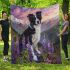 Black and white border collie in the foreground blanket