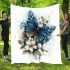 Blue butterfly with white flowers around blanket