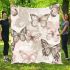 Butterflies and butterfly patterns in soft pink blanket