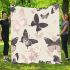 Butterflies and butterfly patterns in soft pink blanket