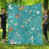 Butterflies and flowers scattered across blanket