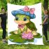Cartoon happy baby turtle with a blue hat blanket