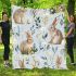 Cute bunnies and flowers on light blue blanket