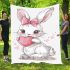 Cute cartoon bunny with a pink bow holding a heart blanket