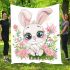 Cute cartoon bunny with big eyes sitting on the flowers blanket