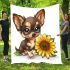 Cute chihuahua puppy with big eyes sitting next to a sunflower blanket