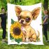 Cute chihuahua puppy with big eyes sitting next to a sunflower blanket