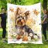 Cute little yorkshire terrier with long hair and bows in her ears blanket