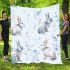 Cute pastel blue bunnies and floral pattern blanket
