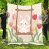 Cute white bunny surrounded by colorful tulips blanket