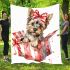 Cute yorkshire terrier inside an open present box blanket