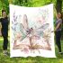 Dragonfly sitting on an open book surrounded flowers blanket