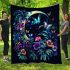 Glowing butterflies dance among vibrant flowers blanket