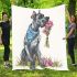 Great dane with a blue bandana sitting holding pink flowers blanket