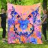 Orange butterfly surrounded by colorful spring flowers blanket