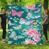Vibrant pattern of pink and turquoise butterflies blanket