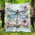 Whimsical watercolor dragonfly perched on an open book blanket