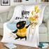 Bee holding yellow and orange wildflowers blanket