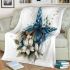 Blue butterfly with white flowers around blanket