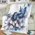 Blue butterfly with white flowers around blanket