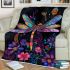Colorful dragonfly among flowers blanket